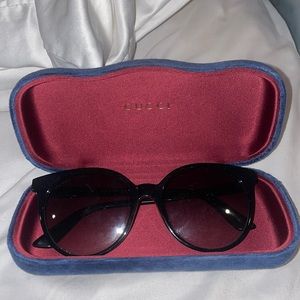 Black Gucci glasses